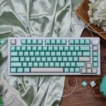 Ethereal shimmering translucent magnetic keycaps set with jade elegance, showcasing their crystal-like PBT+PC design from various angles.