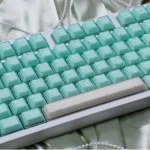 A gallery view of the exquisite shimmering translucent magnetic keycaps set, showcasing their elegant jade aesthetic and PBT+PC premium quality.