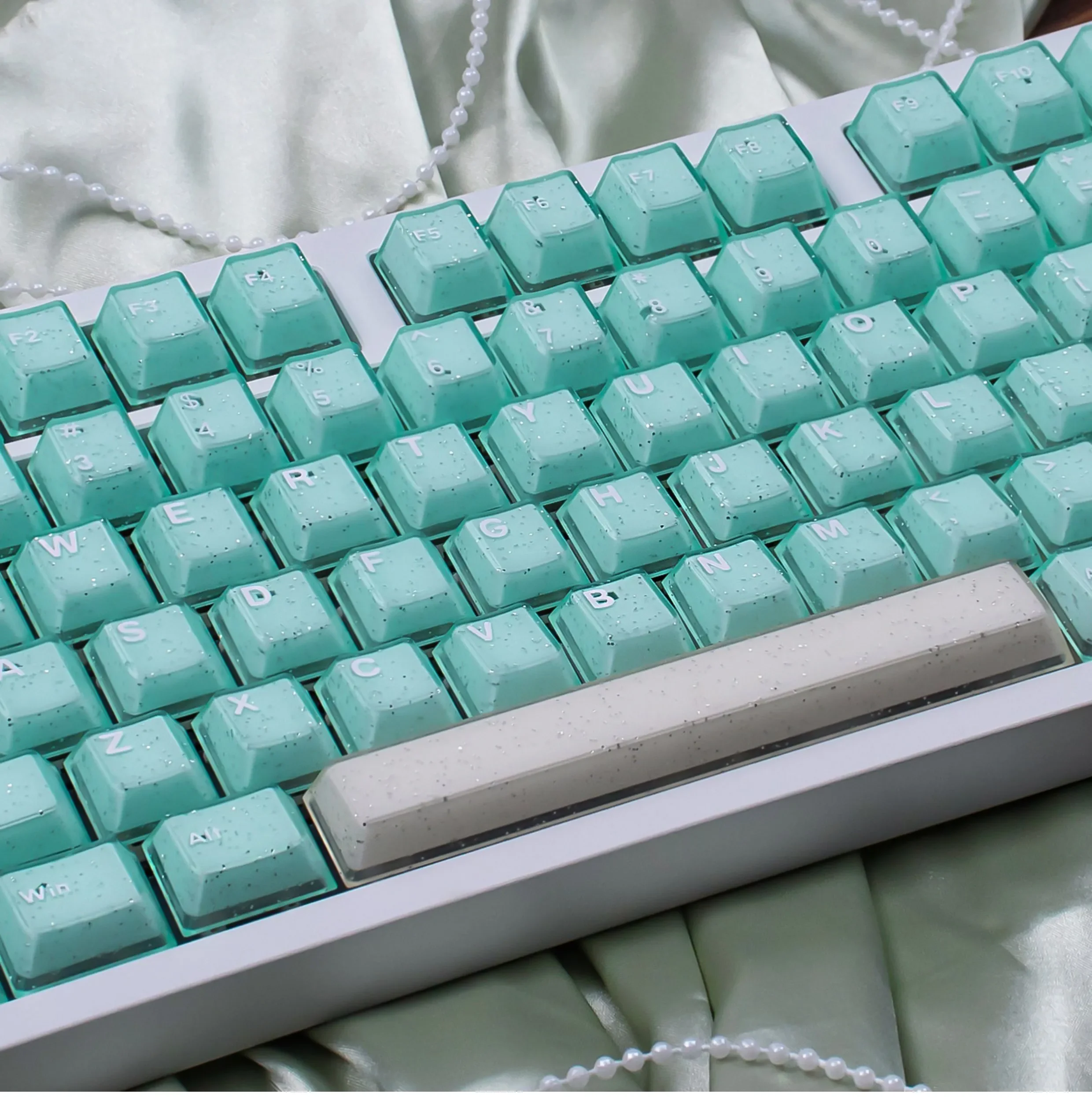 A gallery view of the exquisite shimmering translucent magnetic keycaps set, showcasing their elegant jade aesthetic and PBT+PC premium quality.