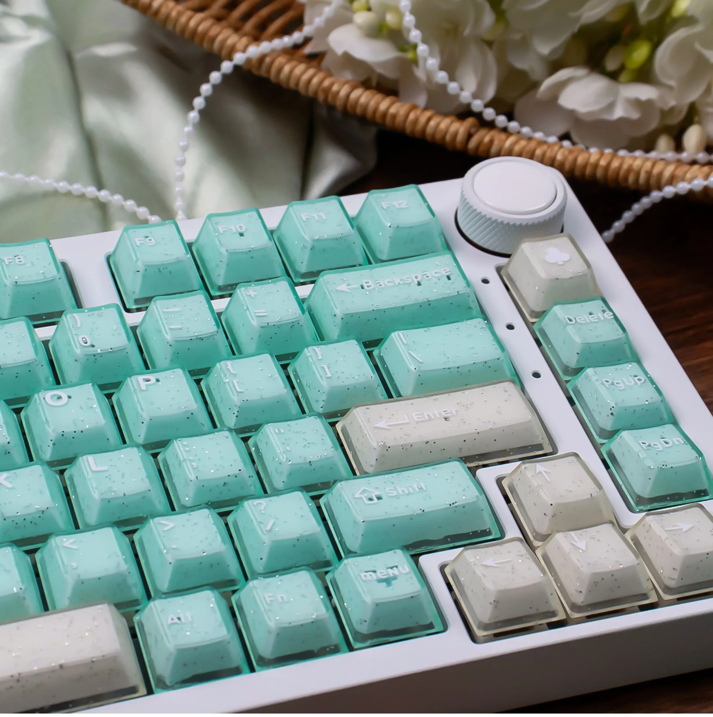 A complete set of ethereal translucent magnetic keycaps set, shimmering like jade from diverse angles, accentuating their unique crystal aesthetics.