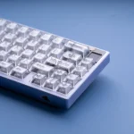 Gallery of Rebellious Elegance Frosted PC Magnetic Keycaps Set, highlighting their ethereal translucent white Cherry profile and unique gothic contours.