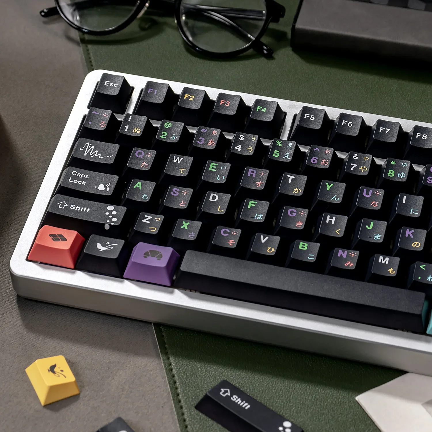 Sophisticated black PBT dye-sublimated magnetic switch keycaps set, custom fit and featuring elegant afternoon tea motifs, displayed in a premium view.