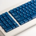 Gallery of the Deep Blue Frosted PC Magnetic Switch Keycaps Set, highlighting its translucent elegance and premium Cherry profile from multiple angles.