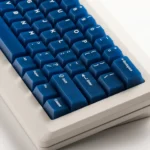 Deep Blue Frosted PC Magnetic Switch Keycaps Set, shown from various angles, highlights its translucent elegance and magnetic switch compatibility.