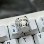 Makima Titanium Keycap gallery: multiple views of the precision-engraved artisan keycap, highlighting its sleek silver and intricate Makima design.