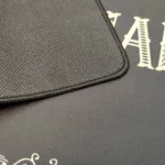 MEGALOBOX Nomad mat with gritty retro-futuristic distressed anime art, waterproof, anti-slip, shown from various angles.