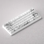 Elegant black and white PBT keycaps set depicting Miyazono Kaori in a unique line art style, enhancing 60, 65, and 68 keyboard aesthetics.