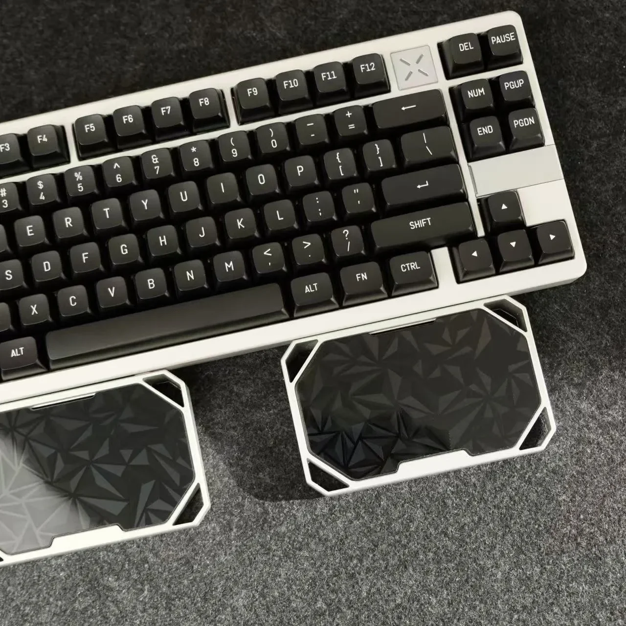 Gallery of the sleek modular aluminum wrist rest, anodized black, emphasizing its customizable split design and ergonomic comfort for mechanical keyboard.