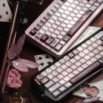 Ethereal Moth Dreams artisan keycaps set, exquisitely handcrafted, featuring intricate moth wing patterns and deep twilight hues for a dreamlike aesthetic.