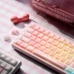 Adorable My Melody Keycaps Set in pink and white jelly, shown from various angles. Spot the side-engraved legends for magnetic switch compatibility.