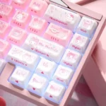 My Melody keycaps set in pink and white jelly, showcased from multiple angles. Adorable side-engraved legends and translucent design for keyboard.