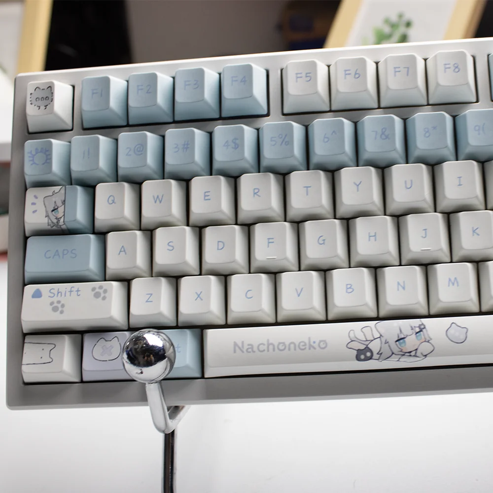 Charming gallery displaying multiple adorable anime Nachoneko keycaps, highlighting their vibrant designs, durable PBT material.
