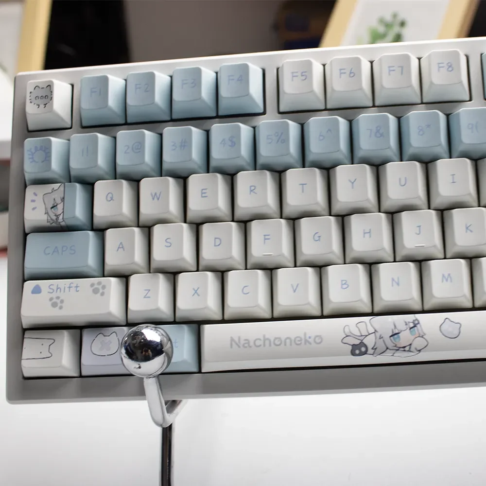 Charming gallery displaying multiple adorable anime Nachoneko keycaps, highlighting their vibrant designs, durable PBT material.