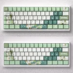 Whimsical Genshin Impact Nahida keycaps set, a PBT dye-sub set for mechanical keyboards, featuring vibrant green and white character motifs.