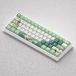 Experience the full whimsical Nahida keycaps set for mechanical keyboards, featuring intricate Genshin Impact PBT dye-sub artistry in vibrant green design.