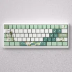 Whimsical Genshin Impact Nahida PBT dye-sub keycaps set in vibrant green and white, showcasing elegant character motifs from multiple angles.