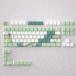 Whimsical Nahida keycaps set for mechanical keyboards, featuring vibrant green and white Genshin Impact Nahida-themed PBT dye-sub designs.