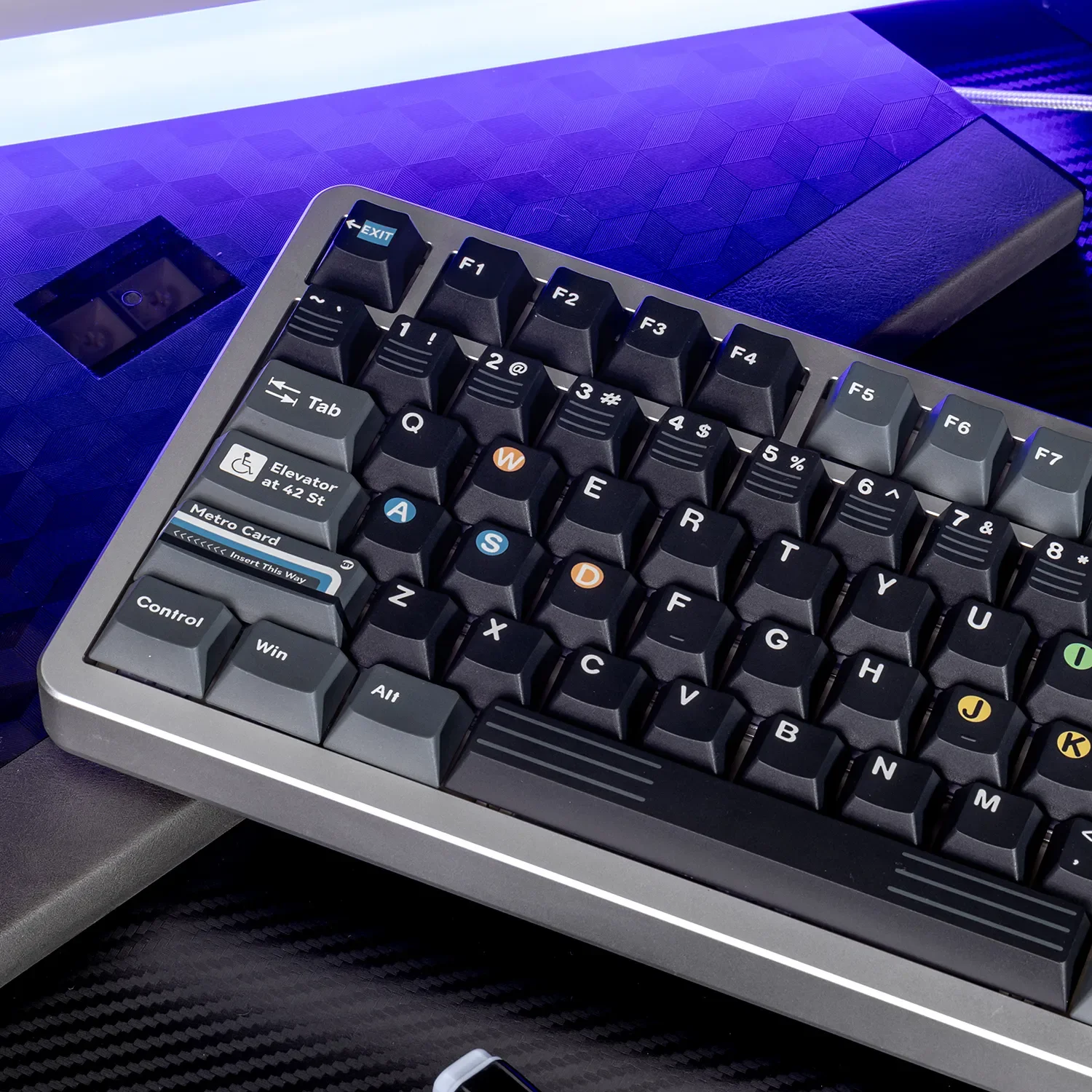 A collection of durable PBT dye-sub New York keycaps set, artfully arranged to showcase iconic NYC subway station designs and crisp, bold typography.