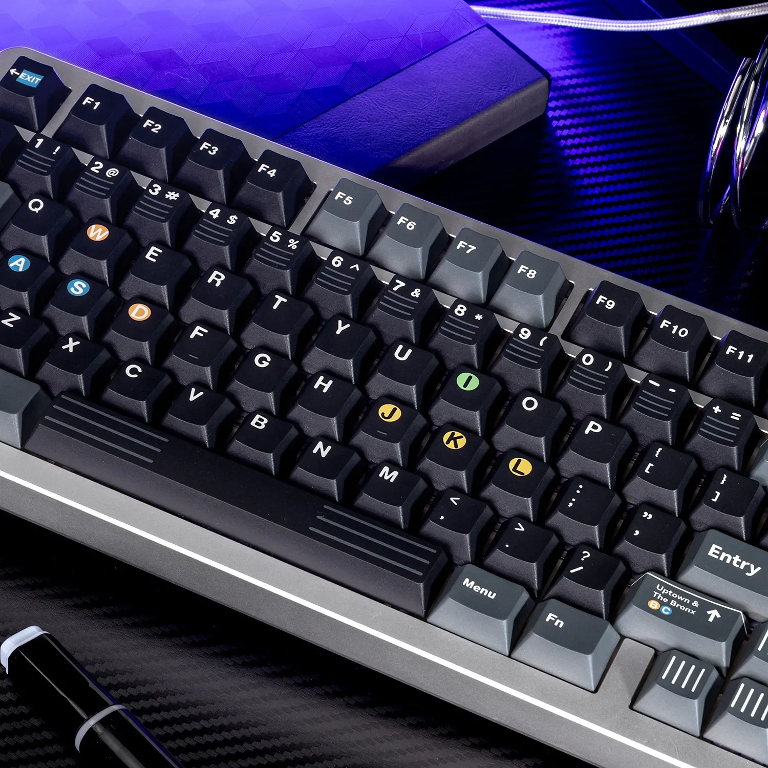 Gallery view of New York Subway PBT dye-sub keycaps set, showcasing iconic NYC typography and contrasting colors from various angles.