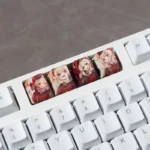 Vibrant Genshin Impact dye-sub PBT accent keycaps showcased from multiple angles, revealing detailed anime character art and premium vivid designs.