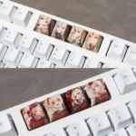 Vibrant Genshin Impact dye-sub PBT accent keycaps showcase detailed anime character art, offering a premium and playful keyboard upgrade.
