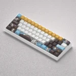 Premium Onodera Kosaki anime PBT dye-sub keycap set displayed in a gallery, showcasing exclusive vibrant character illustrations and durable quality.