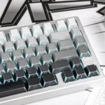 Detailed views of angular translucent PBT side-print keycaps set, showcasing crisp lines, double-shot legends, and dramatic light from multiple premium design.