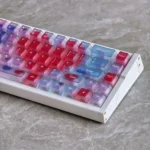 Ethereal Glow PC Keycap Set gallery showcasing premium misty translucent keycaps from various angles, highlighting their backlight-ready elegance