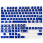 Luminous ceramic PC keycaps set in sapphire blue and pure white, shown from multiple angles, highlighting their clean, premium finish and radiant glow.