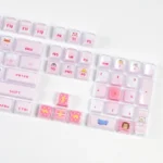 Gallery of the whimsical Peek-a-Boo Pink Cat Keycap Set, showcasing its cute design and crystal jelly aesthetic from multiple angles for mechanical keyboard.