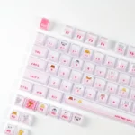 A gallery view of the whimsical pink cat keycap set showcasing its crystal jelly finish from various playful angles for mechanical keyboards.