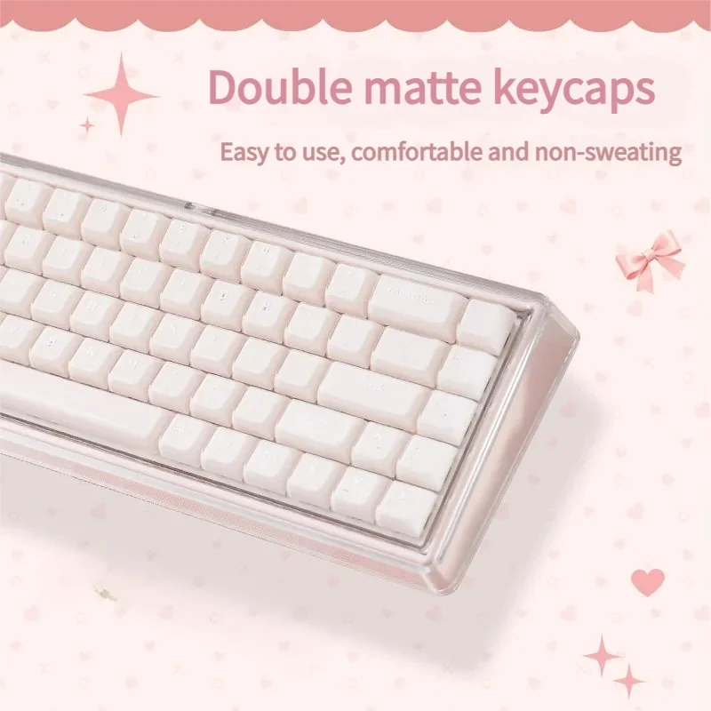 Elegant pink mechanical keyboard displayed from multiple angles, highlighting its soft pastel matte finish, minimalist design, and silent wireless connectivity design.