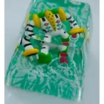 Detailed hand-sculpted Regigigas Pokemon artisan keycap, featuring accurate anime design and vibrant colors, a collectible for fans.