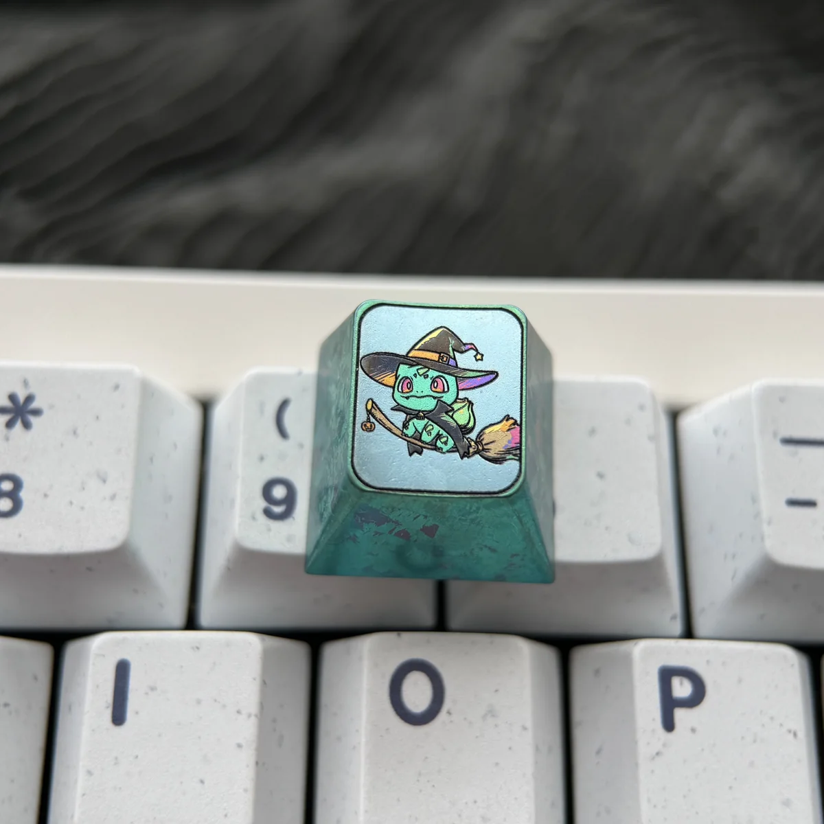 Premium titanium Pokemon Halloween keycap, Theme Four, showcasing a vibrant, intricately detailed Gengar in a spooky scene with a metallic finish.