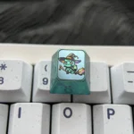 Premium titanium Pokemon Halloween custom ESC keycap, showcased from multiple angles, highlighting its vibrant anime design, intricate details.