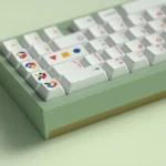 A gallery of QK65 Keycaps, an artistic custom set, revealing its ethereal cosmic patterns and deep space colors from various angles.