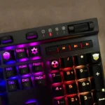 Edgy black ABS R4 nuclear hazard radiation keycap, beautifully backlit, showcasing its vibrant translucent symbol and unique design from a striking angles.