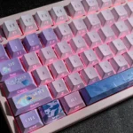 Rafayel Keycap Set. Exclusive double-shot PBT keycaps with elegant character-inspired motifs and clean side-engraved legends.