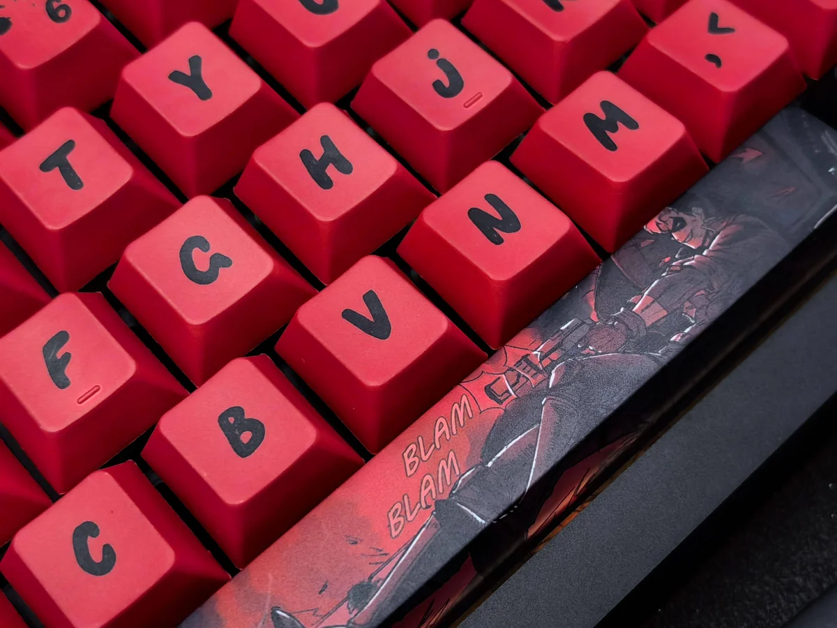 Premium Red Hood Keycaps set, showcasing iconic DC vigilante spirit with bold red and black design from various angles of the complete collection.