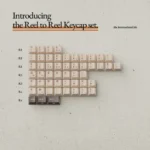 Close-up views of exquisite vintage Reel to Reel Keycaps Set, showcasing intricate retro audio designs from multiple angles, capturing their artistic charm.