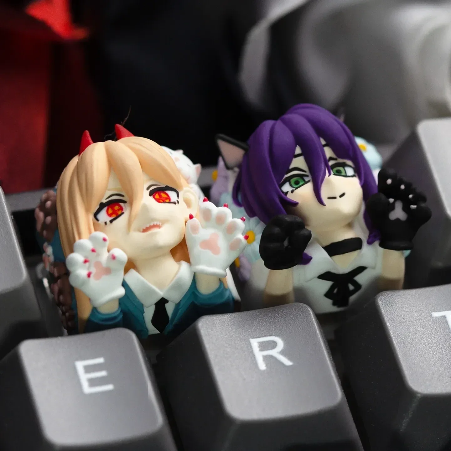 A dynamic, detailed view of the exclusive Reze Keycap, showcasing the explosive Chainsaw Man artisan collectibles intricate design for mechanical keyboard.