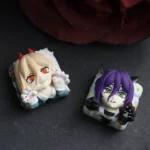 Multiple views of the exclusive Reze Chainsaw Man artisan keycap, showcasing its explosive details and dynamic artistic rendition for mechanical keyboard.