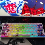 Vibrant Takanashi Rikka keycaps set with whimsical anime art, highlighting the unique side-printed, shine-through PBT legends from various angles.