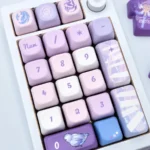 Distinctive Robin FOA Keycap Set, showcasing its serene pastel blue and artistic bird-inspired design from a unique, detailed angle.