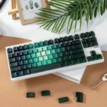 Enchanting Luminous PBT Rose Keycaps set displayed from various angles, highlighting the delicate pink-green floral gradient and side-lit RGB glow.