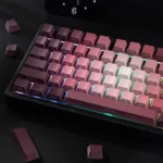 Enchanting Luminous PBT Rose Keycaps set showcasing delicate pink and green gradient floral designs from various angles, highlighting the side-lit design.