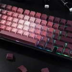 A gallery of Luminous Rose PBT Keycaps Set, displaying the vibrant pink and green gradient floral design from various angles, emphasizing the unique design.
