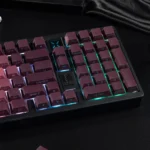 Enchanting PBT rose keycaps set shown from multiple angles, revealing vibrant gradient floral designs and captivating side-lit RGB effects.