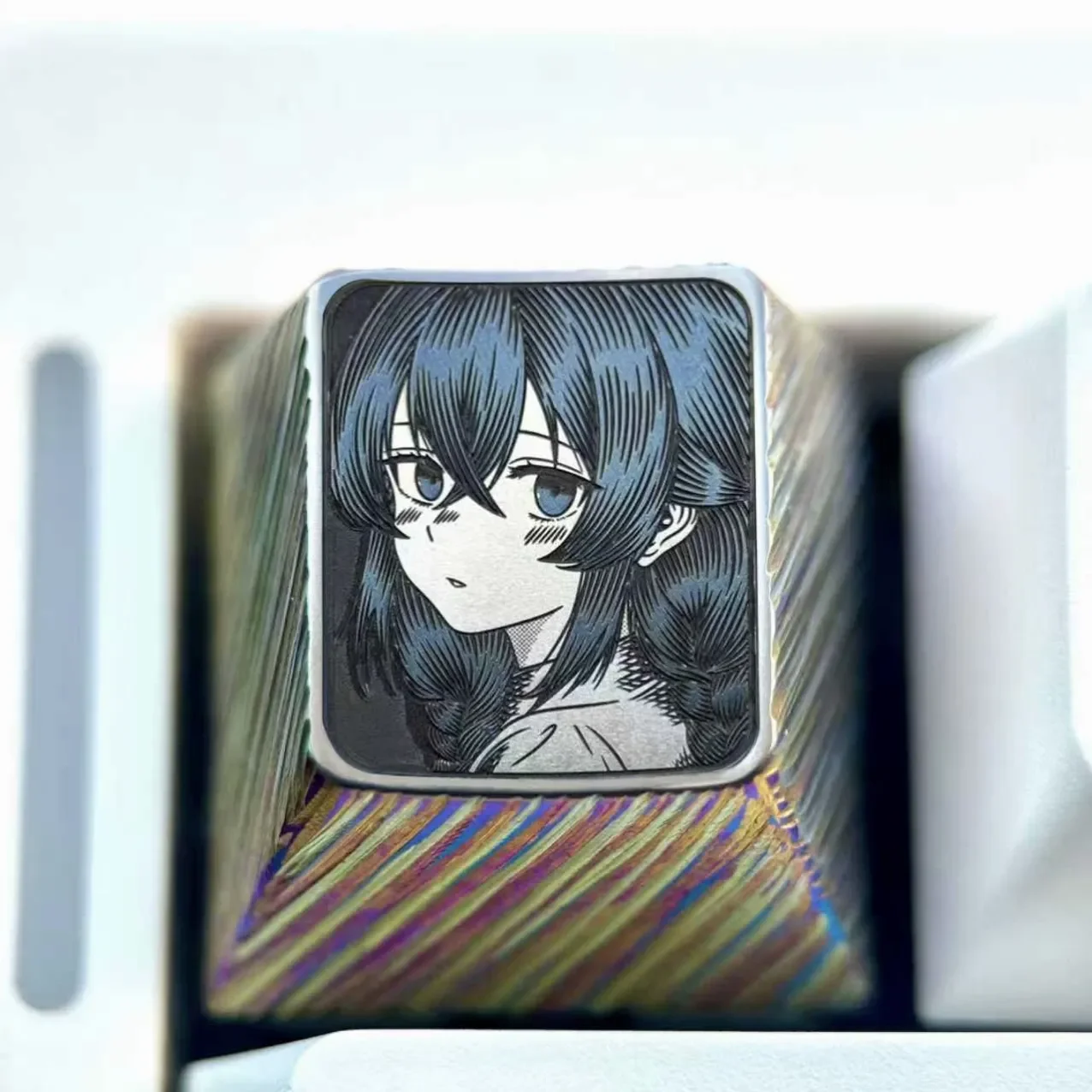 Artistic Roxy Titanium Keycap, precision-carved with anime detail on polished titanium, reflecting subtle silver highlights.