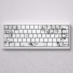 Artistic monochrome Saber PBT line art keycap set beautifully displayed on a mechanical keyboard, highlighting its elegant minimalist aesthetic.